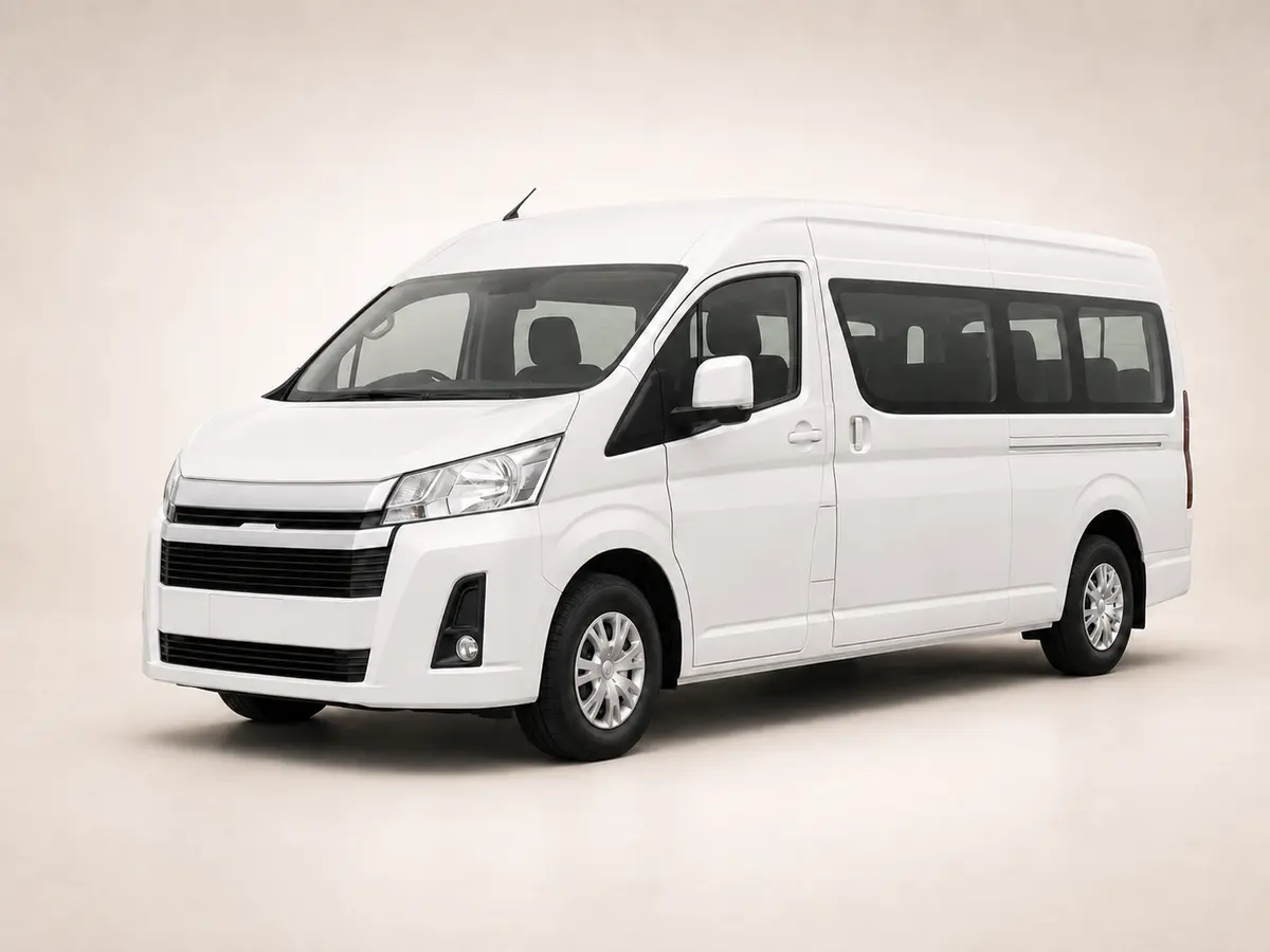 White passenger van available for group transfers